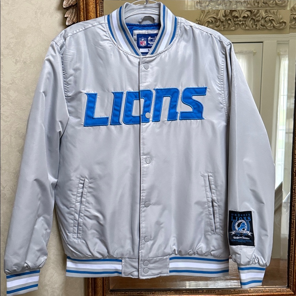 NFL Detroit Lions Varsity Jacket. Sz S. Blue letters on front, Lion emblem/back.